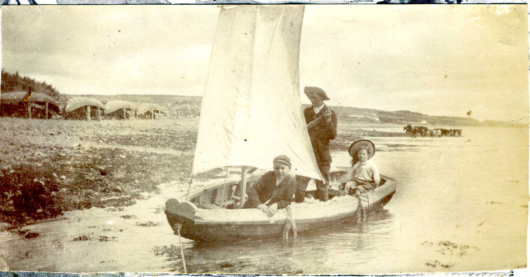 Family sailing on Querrin shore in 1908.