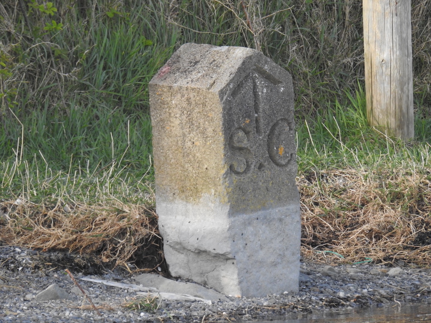 Shannon Comissioners original marker stone at Querrin Pier.
